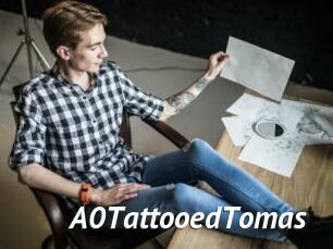 A0TattooedTomas